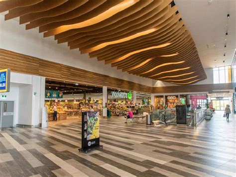 Wave Blades Ceiling A Dynamic Feature In Suburban Marketplace