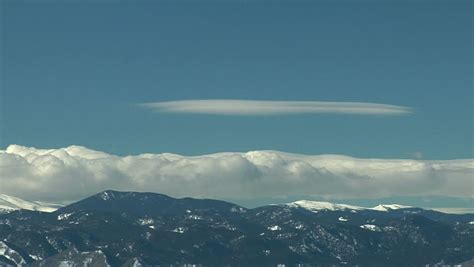 Rolling Off The Mountain A Deep Cap Cloud Escapes From Downslope Winds