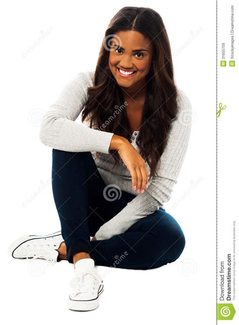 Pretty Girl Sitting On Floor Royalty Free Stock Images
