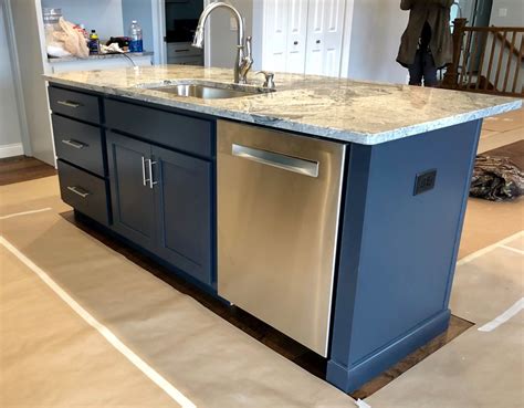 He just had his concrete floors stained and they came out a bit dark. Blue Charcoal Island with Oyster Perimeter Koch Cabinets ...
