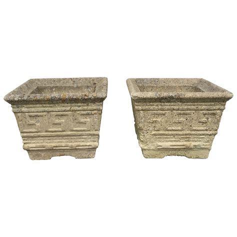 Pair Of French Early 20th Century Painted Cast Iron Planters For Sale