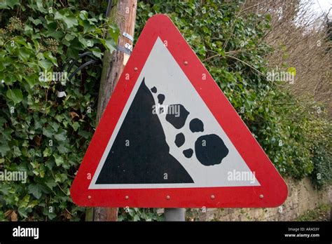 Caution Falling Rocks Road Sign Stock Photo Alamy