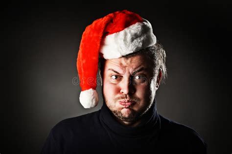 Portrait Of Man Wearing Santa Hat Stock Photo Image Of Burst Crazy