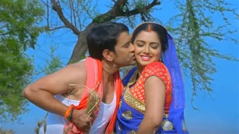 Watch Bhojpuri Bombshell Amrapali Dubey Romances Nirahua Dinesh Lal Yadav In A Barn Song