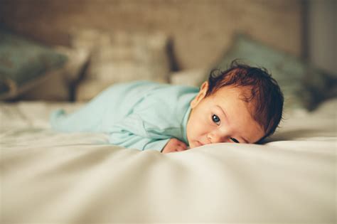 Cute Little Baby Boy Lying On Bed Stock Photo Download Image Now Istock