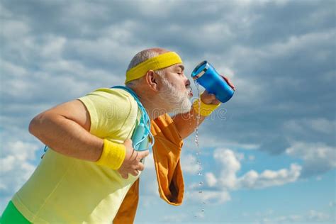 Senior Man Drinking Water Sport And Retirement Concept Senior Man