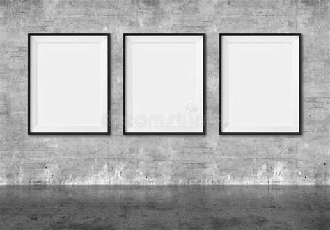 Art Gallery Blank Picture Frames On Grunge Wall Background