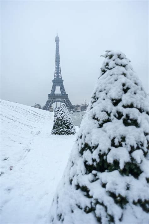 Eiffel Tower Under The Snow In Winter In Paris Stock Photo Image Of