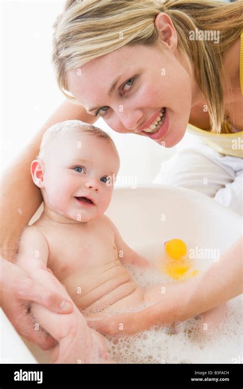 Mother Giving Baby Bubble Bath Smiling Stock Photo Alamy