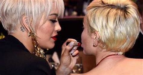 Miley Cyrus And Rita Ora Match Lipsticks And Hairstyles At Grammys