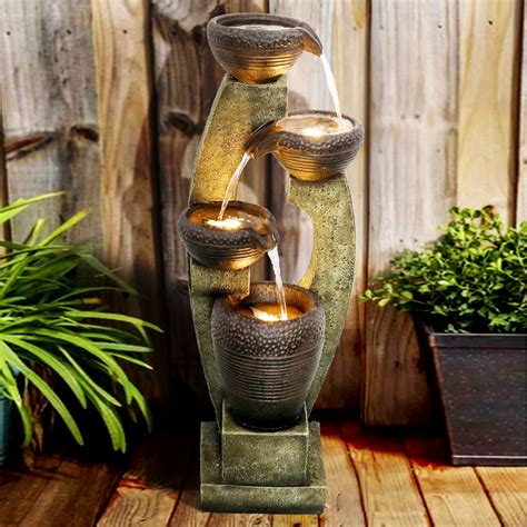 Water fountains are auspicious in feng shui and here's the fountain must always be flowing & not still (except for times of maintenance). 40" H Outdoor Water Fountain - 4 Crocks Outdoor Modern ...