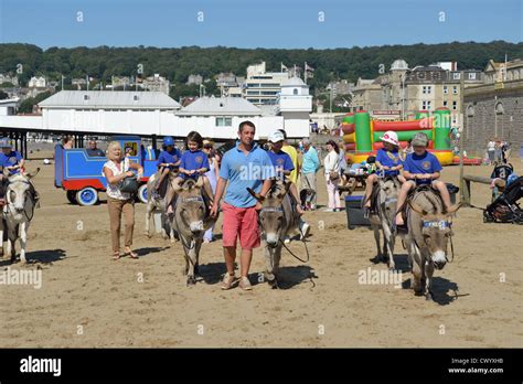 Childrens Donkey Rides On Beach Weston Super Mare Somerset England
