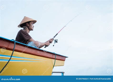 Portrait Of A Young Fisherman Stock Photo Image Of Morning Beach