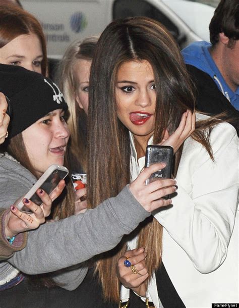 Selena Gomez Makes Funny Faces For Fans Photos Huffpost