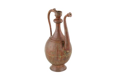 lot 157 a safavid style tinned copper ewer