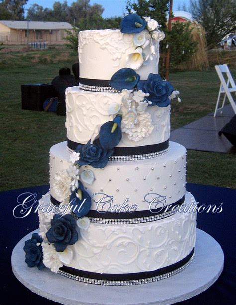 Flower wedding cakes don't just have their beautiful. Elegant White Butter Cream Wedding Cake with Navy Blue ...