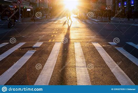 New York City Person Walking Across The Crosswalk On 14th Street And