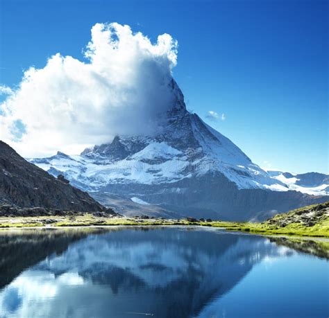 Reflection Of Matterhorn In Lake Riffelsee Stock Photo Image Of Cloud