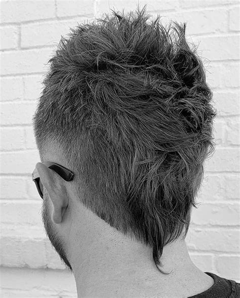 This mullet, aka kentucky waterfall, contrasts sideburns with shaved temples and short straight hair at the front with longer curly flow at the back. 26 Inspiring Rat Tail Hairstyles To Uplift Your Style ...