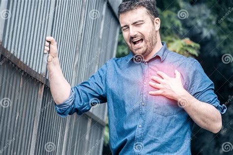 Man Suffering From Chest Pain Having Heart Attack Or Painful Cramps