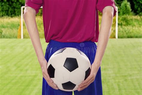 Soccer Player Holds Ball At Behind Stock Image Image Of Competition