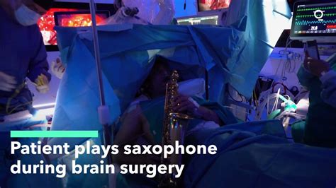 look a 35 year old musician played a saxophone while doctors in italy successfully removed a