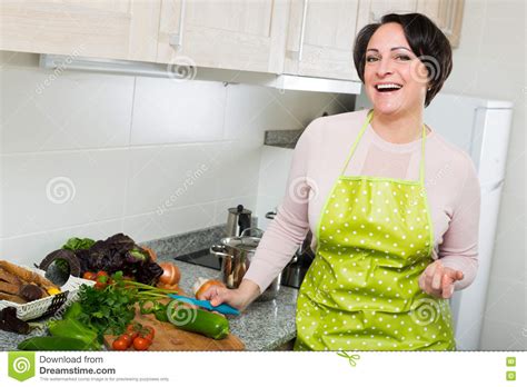 Portrait Of Cooking Brunette Housewife In Apron Stock Photo Image Of