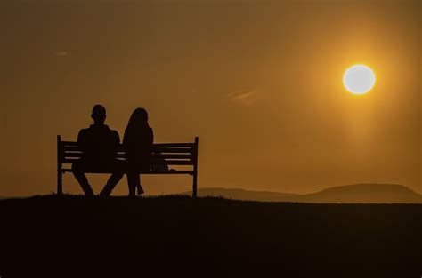 Free Download Battery Pt Silhouette Couple Sitting Bench