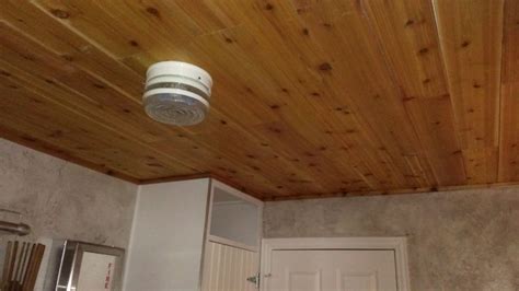 Installing faux wood cedar ceiling planks can be an amazing way to make an ugly popcorn ceiling beautiful. Cedar plank ceiling in our utility room | New house ...