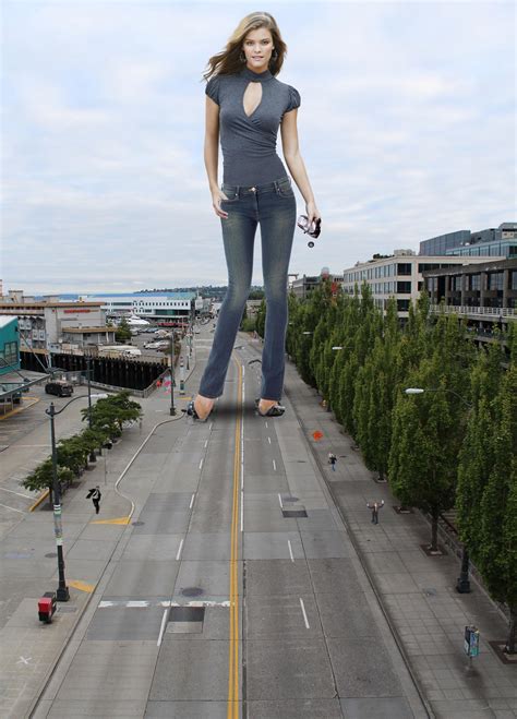 Giant Nina Agdal Crushing Cars On A Seattle Street By The Wonderslug On