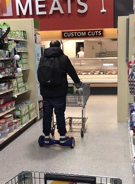 Can You Say Lazy Riding A Hoverboard While Pushing A Grocery Store Shopping Cart Hoverboard