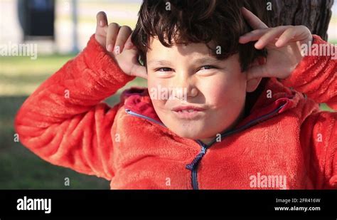 Young Boy Making Funny Faces Stock Video Footage Alamy
