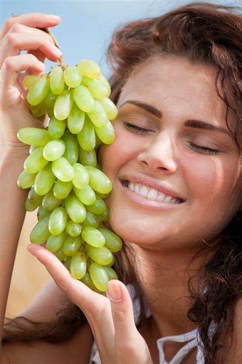 Woman Eating Grapes In Wheat Field Picnic Stock Photo Image 17393730