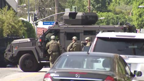 Swat Team Apprehends Barricaded Armed Suspect After Standoff At West