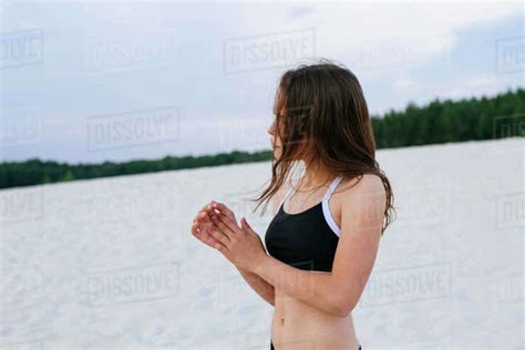 Thoughtful Girl On The Beach Stock Photo Dissolve