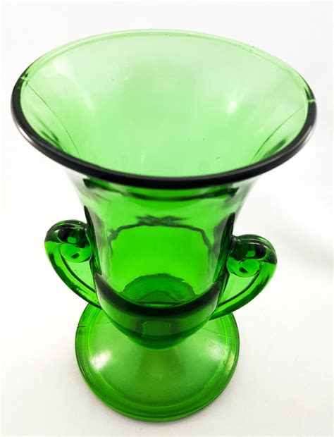 moulded emerald green glass flower vase