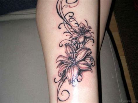 A partially geometric leg tattoo design. 50 Best Flower Tattoos On Leg