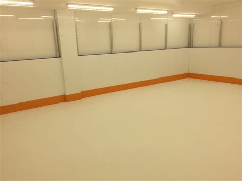 Basement Rink With Synthetic Ice And Plexi Sheilding Center Ice Rinks