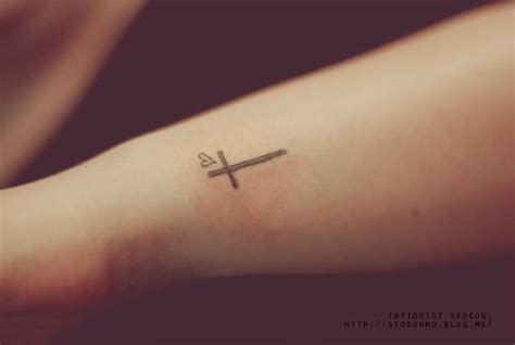 Get 21 Small Cross And Heart Tattoos