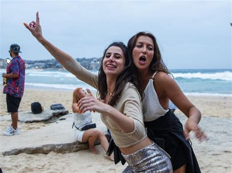 new year s day in sydney bondi beach revellers recover after night of partying herald sun