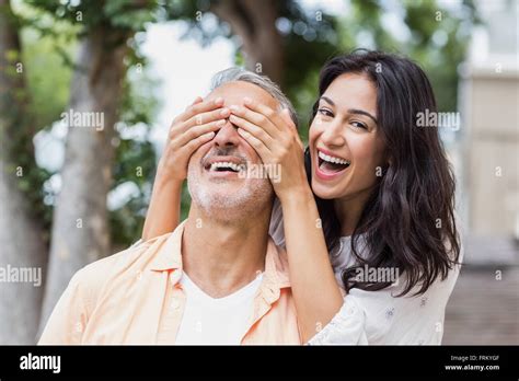 Woman Covering Man S Eyes Hi Res Stock Photography And Images Alamy