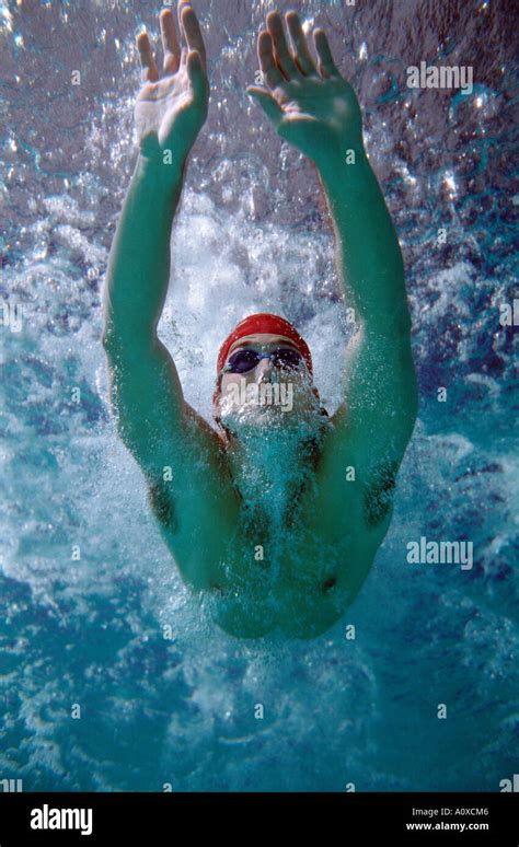Man Dive Into The Swimming Pool Stock Photo Alamy