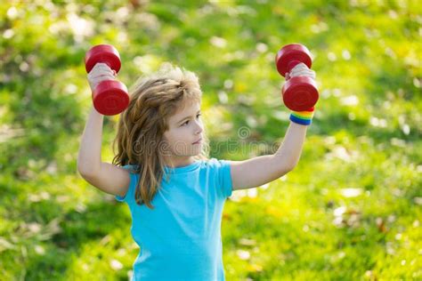 Cute Boy Workout In Park Kid Sport Child Exercising With Dumbbells