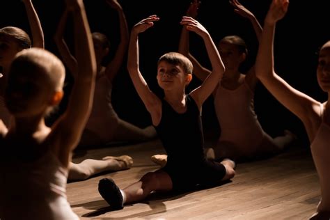 Premium Photo Children Doing Splits While Warming Up On The Stage