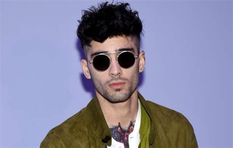 Zayn Teases New Single With Backflipping Purple Haired Version Of Himself
