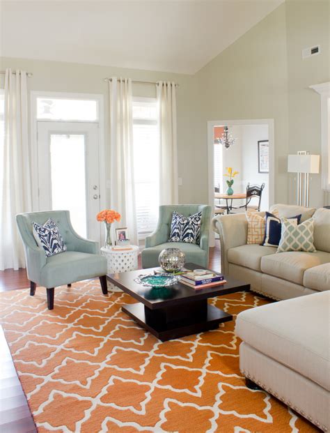 orange and mineral blue living room design