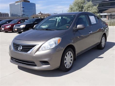 Pre Owned 2012 Nissan Versa Sv Fwd 4dr Car