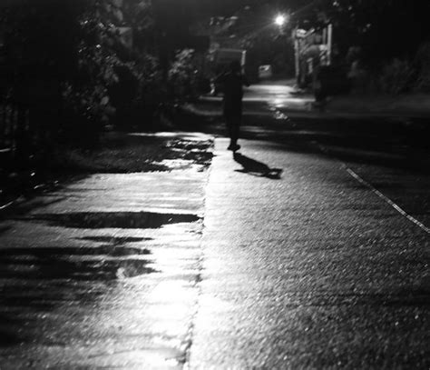 A Lonely Walk A Lone Man Walks Down The Rainy Street In Da Phil