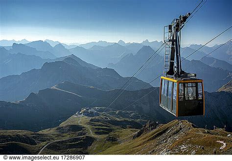 Nebelhorn Cable Car With Foggy Peaks In Background Nebelhorn Cable Car