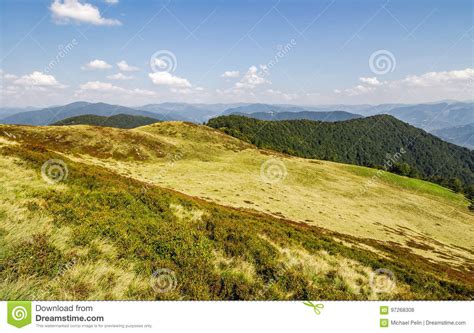 Grassy Hills Of Mountain Ridge In Autumn Stock Photo Image Of Cloud